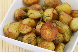 A dish of herby roast potatoes
