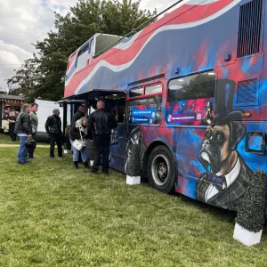 Side view of our British themed party bus for outdoor events