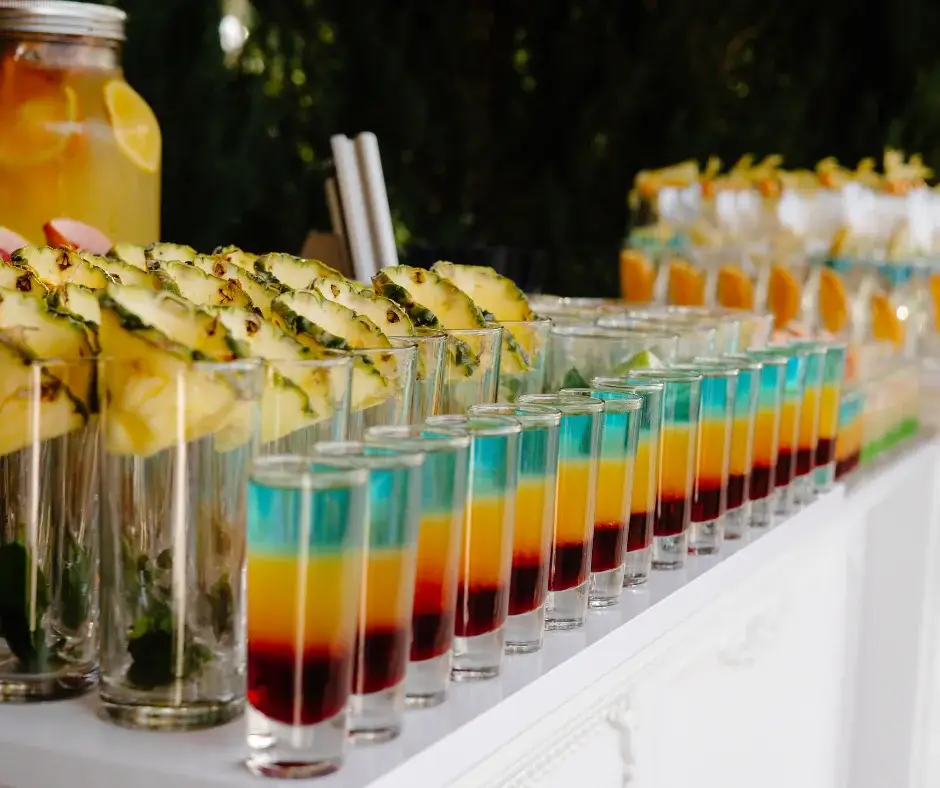 Lines of brightly coloured cocktails